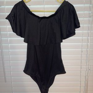 Black off the shoulder bodysuit. Size M. Rue 21